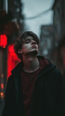 Wall Mural - Teenager with a cigarette in hand, standing in an alley, blurred urban background, moody lighting, minimalistic and edgy style