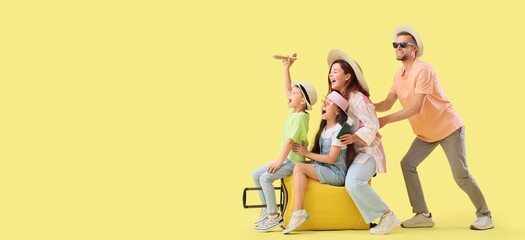 Wall Mural - Family with suitcase and toy airplane on yellow background with space for text. Travel concept