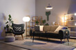 © Pixel-Shot - Interior of dark living room with black sofa, armchair and glowing lamps at night