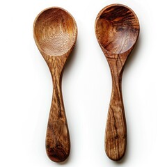 Two handcrafted wooden spoons, dark brown, showcasing unique grain patterns.