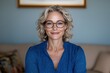 © Balaraw - Portrait of a smiling woman wearing glasses