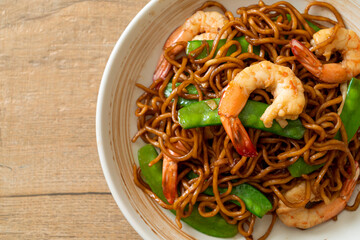 Wall Mural - stir-fried yakisoba noodles with green peas and shrimps