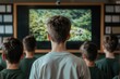 © artchvit - Environmental science drives research for preservation. Children watching a nature documentary on a classroom screen.