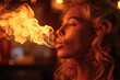 © RISHAD - Young woman breathing fire in dramatic lighting setting