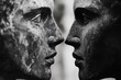 © Natalia - Two statues of faces are shown side by side, with one of them looking sad. Scene is somber and reflective, as if the two faces are looking at each other in a moment of contemplation or introspection