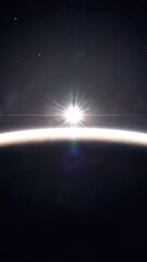 Wall Mural - Vertical Shot of a Sunrise as Seen From Orbit of the Gas Giant Jupiter