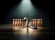 © joeycheung - A single wooden figure is highlighted under a spotlight and magnified by a magnifying glass, standing out from a row of identical figures.  This symbolizes selection, focus, and talent identification.