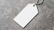 © Sinit - Minimalist White Rectangular Tag on Gray Background