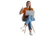 © Omid - stylish young professional seated on a chair, laptop in lap, giving an approval gesture