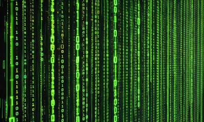 Glowing binary code falling on dark background