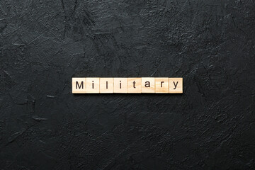 Wall Mural - MILITARY word written on wood block. MILITARY text on cement table for your desing, concept