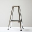 © vadosloginov - Single metal step ladder with non-slip surface suitable for various tasks around the home or workspace