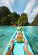 © EVERST - Family kayaking in Philippines, healthy lifestyle active summer vacations parents and child exploring Palawan lagoon tropical vibes