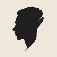 Elegant Silhouette of a Person's Profile Against a Neutral Background