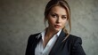 © lorav - Close-up portrait of businesswoman on office background, corporate businesswoman