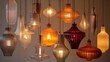 © gita - Collection of hanging pendant lights in various shapes, colors, and textures, illuminated against a neutral background.
