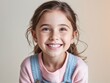 © Hannah - beautiful cute girl with brown hair smiling happily wearing a pink casual shirt, plain background