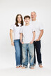 © Stefanie - Studio portrait of father with two teenage kids.