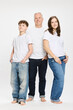 © Stefanie - Studio portrait of father with two teenage kids.