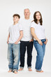 © Stefanie - Studio portrait of father with two teenage kids.