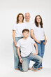 © Stefanie - Family portrait of mother and father with two teenage kids.