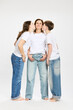 © Stefanie - Studio portrait of mother with two teenage kids.