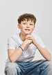 © Stefanie - Studio portrait of teenage boy.