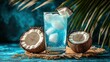 © Rizqiana - Blue coconut cocktail with ice, tropical background.