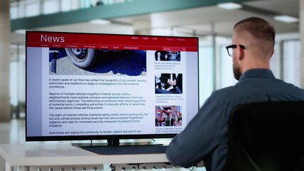 Watching Online News Article On Mobile Phone And Laptop