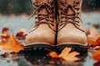 © Sanchai - A close-up of khaki laces being tied on rugged outdoor boots, with dry dirt and leaves scattered on the ground