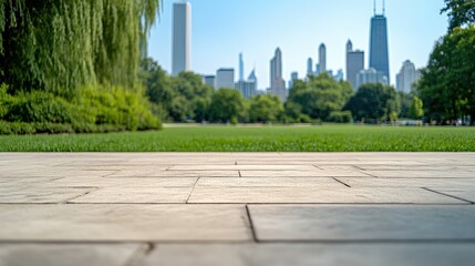 An expansive view features a vibrant city skyline behind an empty square, surrounded by lush greenery and trees on a sunny day