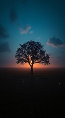 Wall Mural - Wallpaper of a solitary tree silhouetted against a vibrant orange and blue sunset.