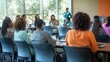 © sambath - A workshop setting where a career coach is addressing a group of job seekers.