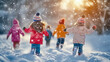 © Be the best - Group of little children having fun outdoors in winter with snow with place for text or inscriptions