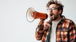 © Barosanu - A surprised man with curly hair holds an orange megaphone in hand, showcasing a dynamic expression that highlights spontaneity and the excitement of the moment.