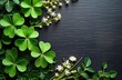 © Maryna - Fresh green shamrocks, white flowers arranged on dark wood table. Botanical composition. Natural pattern. Perfect still life design. Spring summer vibe. Organic, vibrant elements. Excellent for
