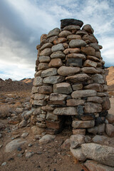 Rock Stack Smelter. A round rock stack smelter used to extract minerals from ore. Located in the ghost town site of White Mountain City, CA.