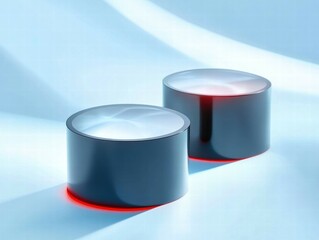 Aufkleber - Two sleek, illuminated cylindrical objects on a smooth surface, suggesting modern design.