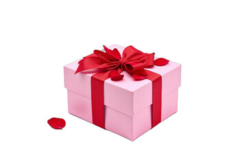 Valentine Day: Valentine Day concept: A pink gift box tied with a red bow filled with rose petals isolated on white background.
