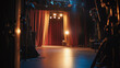 © Shanorsila - An intimate backstage shot of a stage with curtains pulled aside, revealing the glow of spotlights and equipment, capturing the behind-the-scenes magic of theater production.