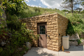 Wall Mural - Building Built At The Natural Entrace to Wind Cave