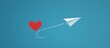 A paper plane flying with a dotted heart-shaped trail behind it