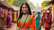 © Wabisabi - Bellissima giovane donna indiana sorridente con capelli lunghi neri vestita con abiti tradizionali posa per una foto in strada in un villaggio in India