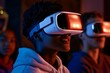 © c80 - Engaging youth participate in virtual reality experience in a dimly lit room