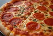 © ILIUSIA - Close-up of pepperoni pizza with fresh basil.
