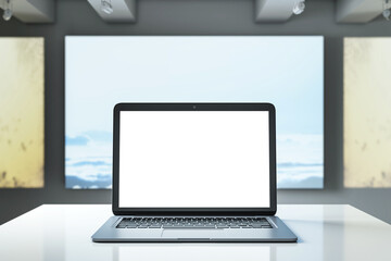 Wall Mural - Laptop with blank white screen on desk in front of abstract background. 3D Rendering