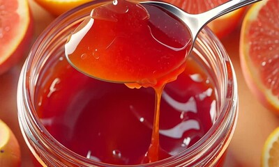 Wall Mural - Guava fruit jam in a jar with spoon, closeup