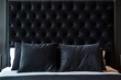 © Cloudyew - Elegant black tufted headboard with plush pillows, perfect for modern bedroom decor and luxury interior design inspiration.