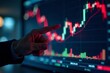 © patiphan - Pointing at stock market graph on electronic screen, digital screen, finance