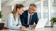 © Amina - business people working together in office